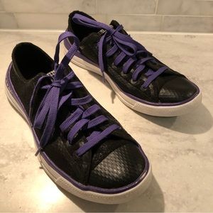 Converse black sneakers with purple laces and white soles.  EUC!